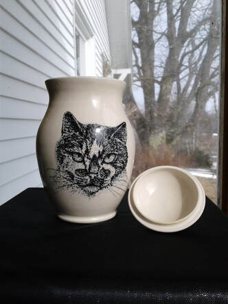 Pottery Urn-Clawd